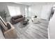 Cozy living room features modern decor and a window providing natural light at 7807 Inverness Dr, Indianapolis, IN 46237