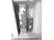 A modern heating and water system are tucked neatly into utility room at 7807 Inverness Dr, Indianapolis, IN 46237