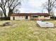 Expansive backyard with patio and fire pit at 812 Madison St, Frankton, IN 46044