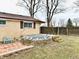 Backyard with a unique brick patio and above ground pool at 812 Madison St, Frankton, IN 46044