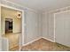 Bright living room with door, tile floors and view to kitchen at 812 Madison St, Frankton, IN 46044