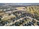 Panoramic aerial view of the residential neighborhood showing the community, trees, and nearby golf course at 8352 Alcona Dr, Indianapolis, IN 46237