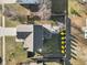 Aerial view of the backyard featuring patio, fire pit, and fenced yard at 8352 Alcona Dr, Indianapolis, IN 46237