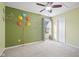 Bright bedroom features whimsical balloon wall decals that add a playful touch at 8352 Alcona Dr, Indianapolis, IN 46237