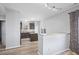 Modern kitchen featuring an island, dark cabinetry, and stainless steel appliances at 8352 Alcona Dr, Indianapolis, IN 46237