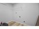 A clean laundry room features a functional layout and practical shelving solutions for storage and organization at 8352 Alcona Dr, Indianapolis, IN 46237