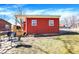 Charming backyard featuring a red building, open lawn space, and outdoor seating at 8657 S Nash Dr, Nineveh, IN 46164