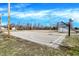 Outdoor basketball court with lighting, ideal for sports and recreational activities at 8657 S Nash Dr, Nineveh, IN 46164