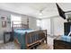 Cozy bedroom featuring natural light, two closets, a ceiling fan and an decorative bed frame at 8657 S Nash Dr, Nineveh, IN 46164
