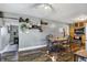 A spacious dining area connecting to the kitchen with wood-like flooring at 8657 S Nash Dr, Nineveh, IN 46164