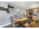 Open dining area with warm decor adjacent to the kitchen at 8657 S Nash Dr, Nineveh, IN 46164
