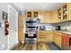 A bright kitchen offering stainless steel appliances and ample cabinet space at 8657 S Nash Dr, Nineveh, IN 46164