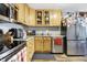 A cozy kitchen with stainless steel appliances and light wood cabinetry at 8657 S Nash Dr, Nineveh, IN 46164