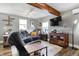 Comfortable living room with a cozy sofa, TV, and natural light creating a relaxing atmosphere at 8657 S Nash Dr, Nineveh, IN 46164