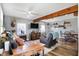 Spacious living room with comfortable seating, a TV, and wood flooring, ideal for relaxation and entertainment at 8657 S Nash Dr, Nineveh, IN 46164