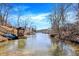 Community lake view with docks and boat storage areas, perfect for water enthusiasts at 8657 S Nash Dr, Nineveh, IN 46164