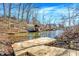 Image of the wooden dock and waterfront area of the community lake at 8657 S Nash Dr, Nineveh, IN 46164
