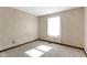 Image of a bedroom with neutral walls, carpet, baseboard trim, and window with curtains at 8831 Lincolncreek Cir, Indianapolis, IN 46234