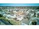 Charming aerial view of homes with fenced backyards, and mature trees offering shade and privacy at 917 Claiborne Ln, Lebanon, IN 46052