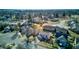 Beautiful aerial view of a well-kept residential neighborhood featuring mature trees and manicured lawns at 917 Claiborne Ln, Lebanon, IN 46052