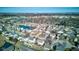 Attractive aerial view of a Gathering-friendly neighborhood with a pond and tree-lined streets at 917 Claiborne Ln, Lebanon, IN 46052