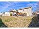 Backyard features a deck, a pergola covered outdoor area and a large grass area at 917 Claiborne Ln, Lebanon, IN 46052