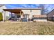 Backyard featuring a pergola covered outdoor area, a deck area, and a grass area at 917 Claiborne Ln, Lebanon, IN 46052