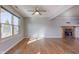 Spacious basement with fireplace, hardwood floors, and large window at 917 Claiborne Ln, Lebanon, IN 46052
