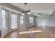 Bright and airy kitchen area with a large window and hardwood flooring at 917 Claiborne Ln, Lebanon, IN 46052