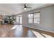 Sun-filled living area provides a view of the kitchen, and access to the backyard at 917 Claiborne Ln, Lebanon, IN 46052