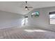 Spacious main bedroom with vaulted ceiling, fan, and natural light at 917 Claiborne Ln, Lebanon, IN 46052