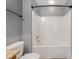 Bathroom featuring a shower over tub, and easy-to-clean white finishes at 9730 Prairie Smoke Dr, Noblesville, IN 46060