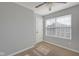 Bright bedroom with natural light features a ceiling fan and neutral carpet at 9730 Prairie Smoke Dr, Noblesville, IN 46060