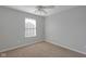 Bedroom features neutral walls and carpeting with plenty of natural light at 9730 Prairie Smoke Dr, Noblesville, IN 46060