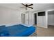 Neutral bedroom with a TV, walk-in closet, and an ensuite bathroom for convenience at 9730 Prairie Smoke Dr, Noblesville, IN 46060