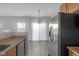 Kitchen featuring stainless appliances, a sink, and a breakfast bar at 9730 Prairie Smoke Dr, Noblesville, IN 46060