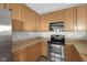 Kitchen with plenty of cabinet space and stainless steel appliances at 9730 Prairie Smoke Dr, Noblesville, IN 46060