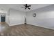 Spacious living room with stylish floors and a view of front door at 9730 Prairie Smoke Dr, Noblesville, IN 46060