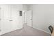 Carpeted bedroom offers ample storage space with dual closets and easy access to other rooms at 1004 Astor Ln, Carmel, IN 46032