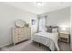 Comfortable bedroom with stylish furnishings and a window providing natural light at 1004 Astor Ln, Carmel, IN 46032