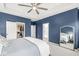 This primary bedroom leads to a walk-in closet and primary bath, offering style and convenience at 1004 Astor Ln, Carmel, IN 46032