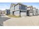 Attractive neighborhood street with modern townhomes, offering a desirable community setting at 1004 Astor Ln, Carmel, IN 46032