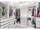 This walk-in closet offers custom shelving, drawers, and ample space to organize your wardrobe at 1004 Astor Ln, Carmel, IN 46032