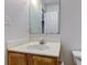 Bathroom vanity featuring a sink, a mirror and white countertop at 10046 Gate Dr, Indianapolis, IN 46239