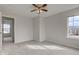 This bedroom is spacious, featuring neutral carpet and natural light at 10046 Gate Dr, Indianapolis, IN 46239