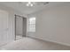 This bedroom has a mirrored closet with a fan and great natural light at 10046 Gate Dr, Indianapolis, IN 46239