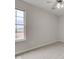 This bedroom offers a neutral color palette, plush carpet, and bright natural light at 10046 Gate Dr, Indianapolis, IN 46239