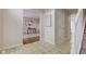 Well-lit foyer with tile flooring, connecting to the living spaces for a seamless flow at 10046 Gate Dr, Indianapolis, IN 46239