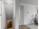 Hallway with stairs and vinyl floors at 10046 Gate Dr, Indianapolis, IN 46239