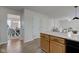Kitchen view from an open floor plan of a cozy living room space at 10046 Gate Dr, Indianapolis, IN 46239